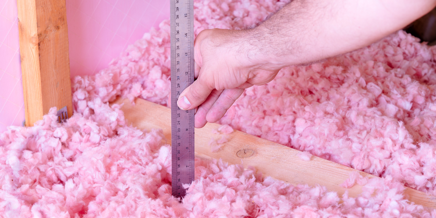 Checking Attic insulation depth -How to Insulate Your Attic this Winter
