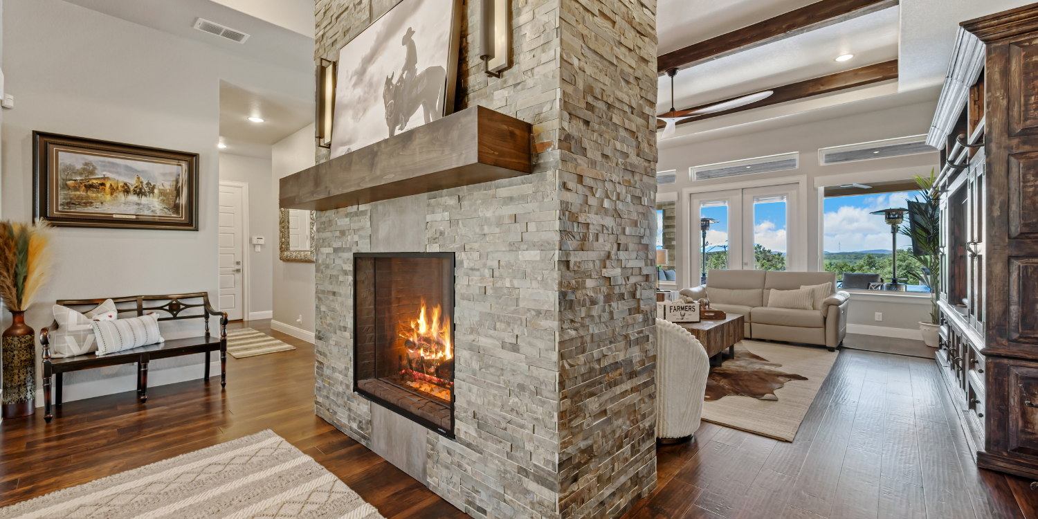 Gas Fireplace in a dividing wall in home - Is a Gas Fireplace Worth It? 7 Reasons Why It Is (Infographic)
